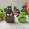 kf S1a1d70f1557644aabf0e6a15aadd7e7ca Plants VS Zombies Blocks Small Cartoon Mini Building Block Peashooter SunFlower Chomper Assemble Action Model Doll - Plants vs Zombies Store