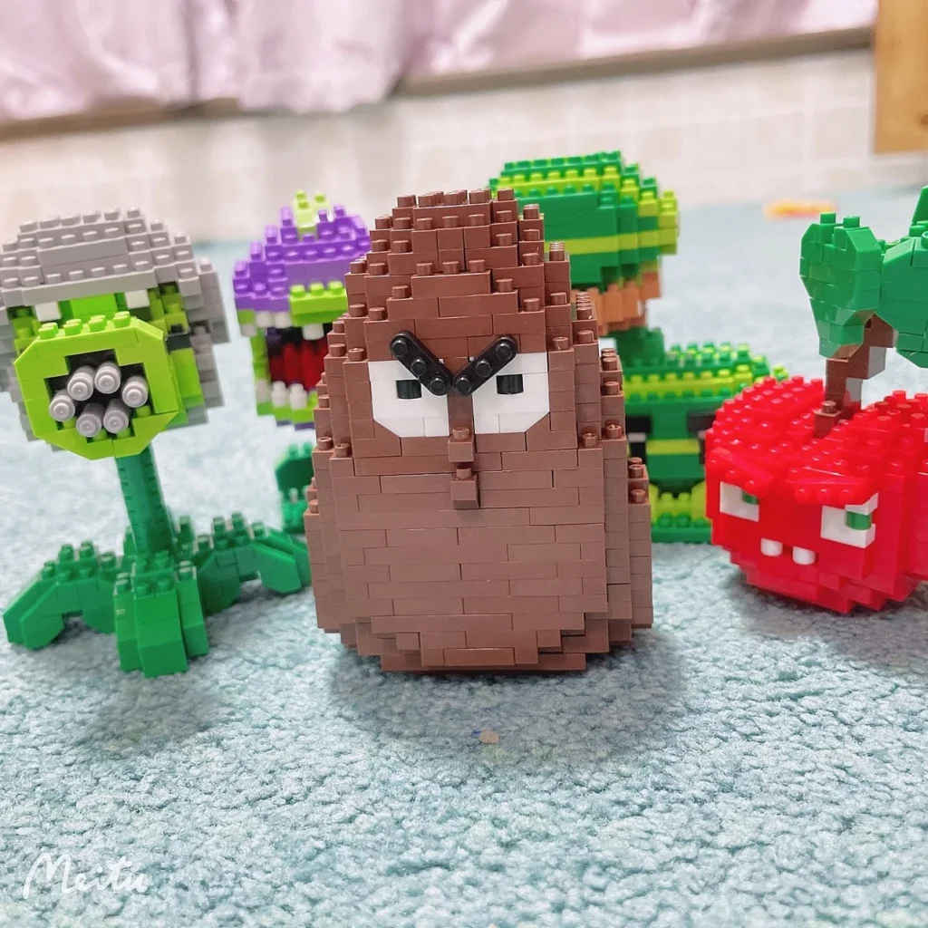kf Sf415837b1c594490a3b1d023177e5455v Plants VS Zombies Blocks Small Cartoon Mini Building Block Peashooter SunFlower Chomper Assemble Action Model Doll - Plants vs Zombies Store